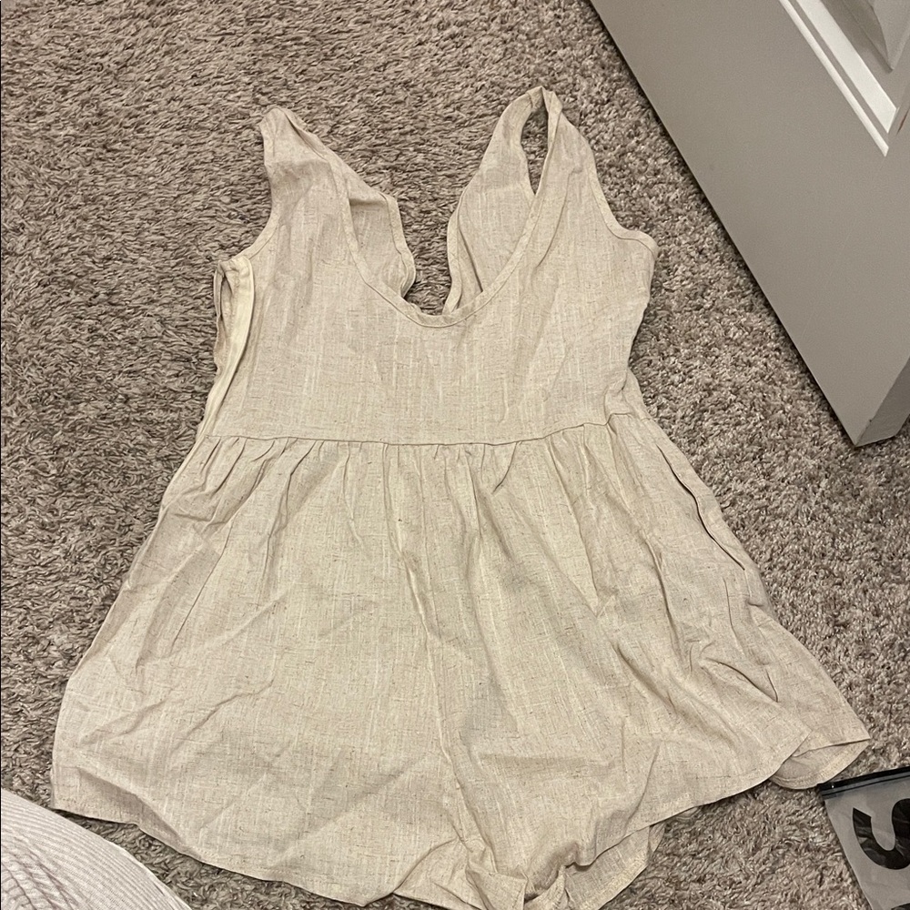 Beige Sleeveless Romper size Small never been worn